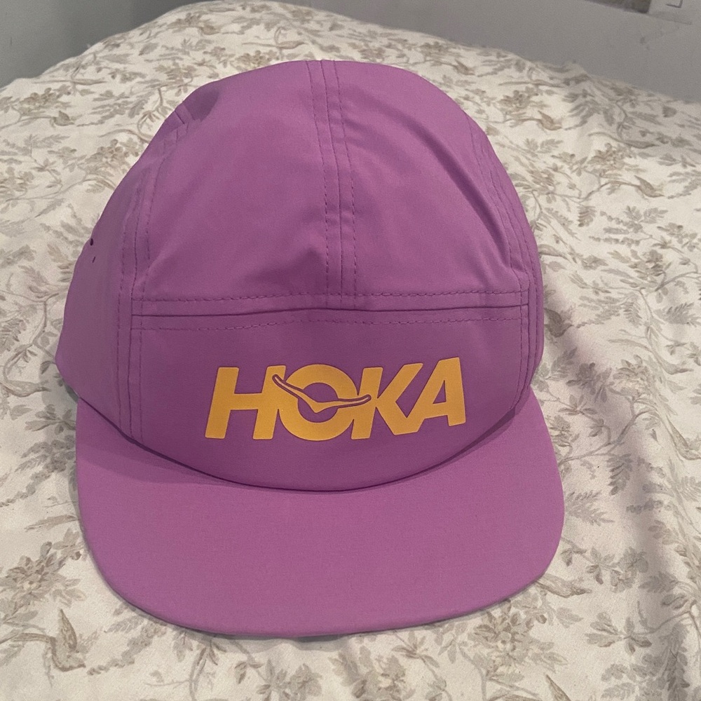 Hoka purple cap with yellow logo